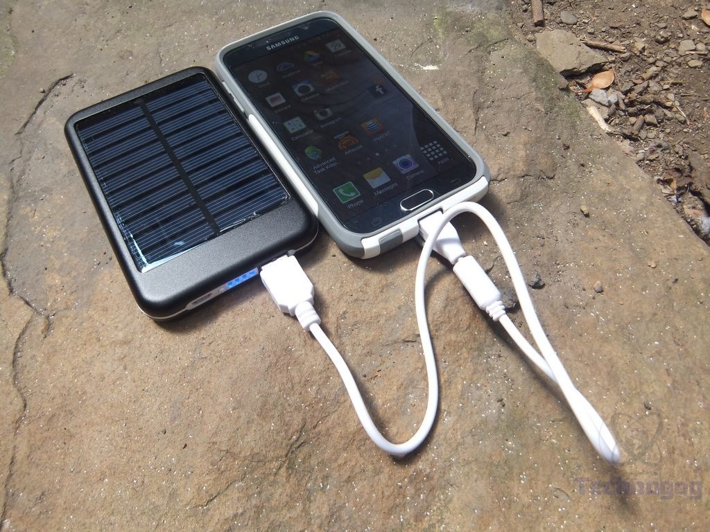 Hand-held Solar Charger/Power Pack