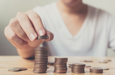 Man hands putting coins stack, Concept business finance save money and investment