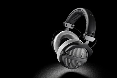 Headphones. Professional over-ear open back earphones on black background